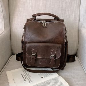 Zaino vintage in similpelle marrone con libro